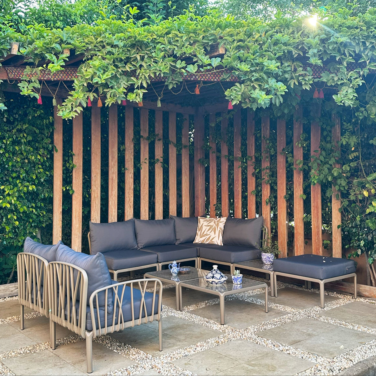 Traverse Set (4 Seaters L-Shape Sofa WO Arm Rests + 3 Tables + Pouf + 2 Seaters Sofa) for Outdoor Furniture โ Modern outdoor set with L-shape and two-seater sofas, tables, and pouf for relaxation.