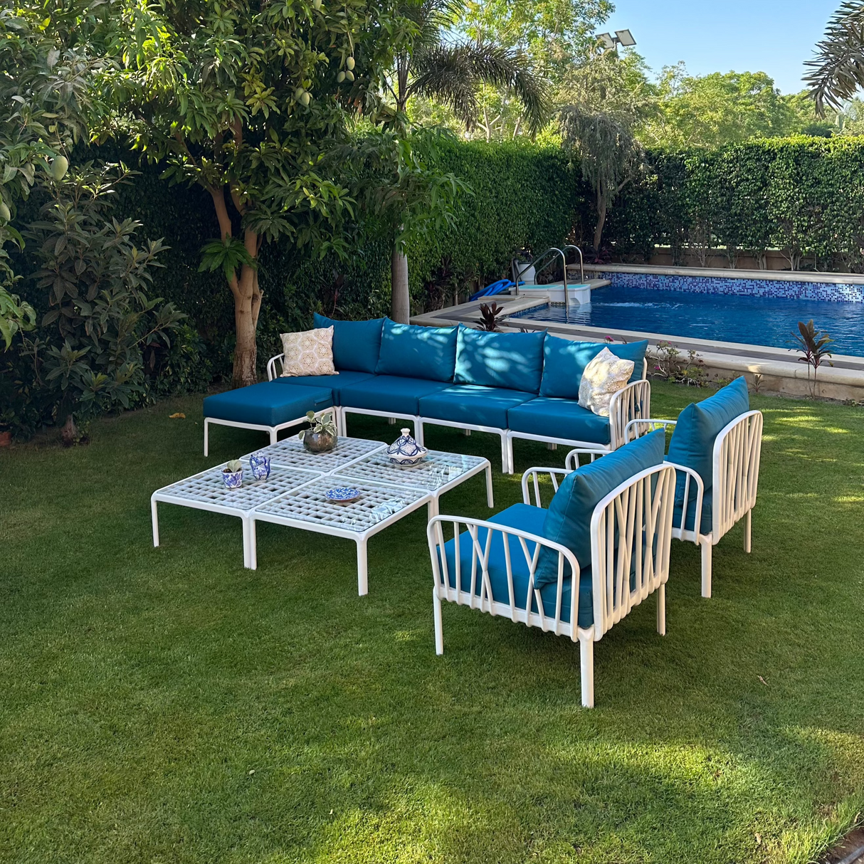 Traverse Set (4 Seaters Sofa With Pouf, 4 Tables and 2 Arm Chairs) for Outdoor Furniture โ Complete outdoor living set with comfortable seating and functional tables.