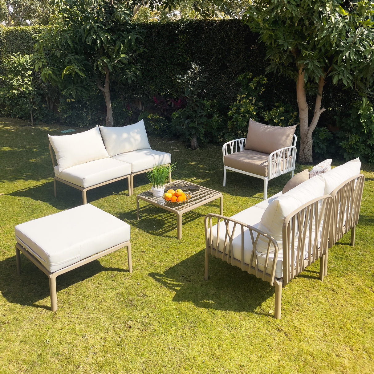 Traverse Two Seaters Sofa + 2 Seaters Sofa without Arm Rests + Chair + Pouf + Table for Outdoor Furniture โ Complete outdoor set with two-seater sofas, chair, pouf, and table.