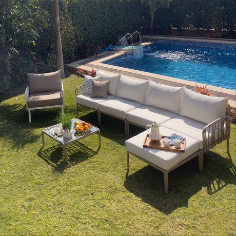Traverse Set (4 Seaters Sofa With Pouf, Table and Arm Chair) for Outdoor Furniture – Luxurious outdoor set featuring a 4-seater sofa, pouf, table, and armchair for your outdoor area.